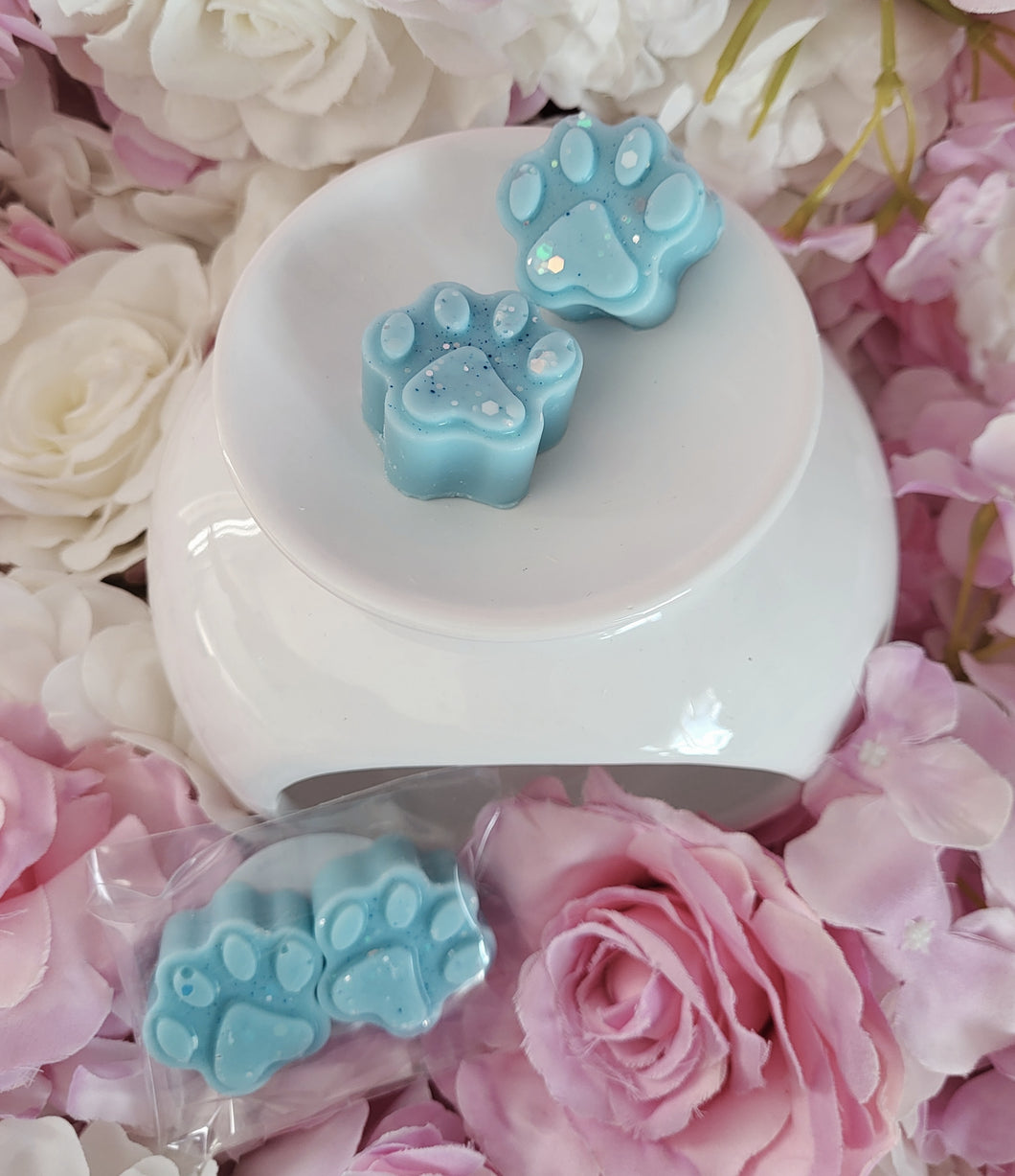 Blue paw print wax melt shapes in luna fragrance