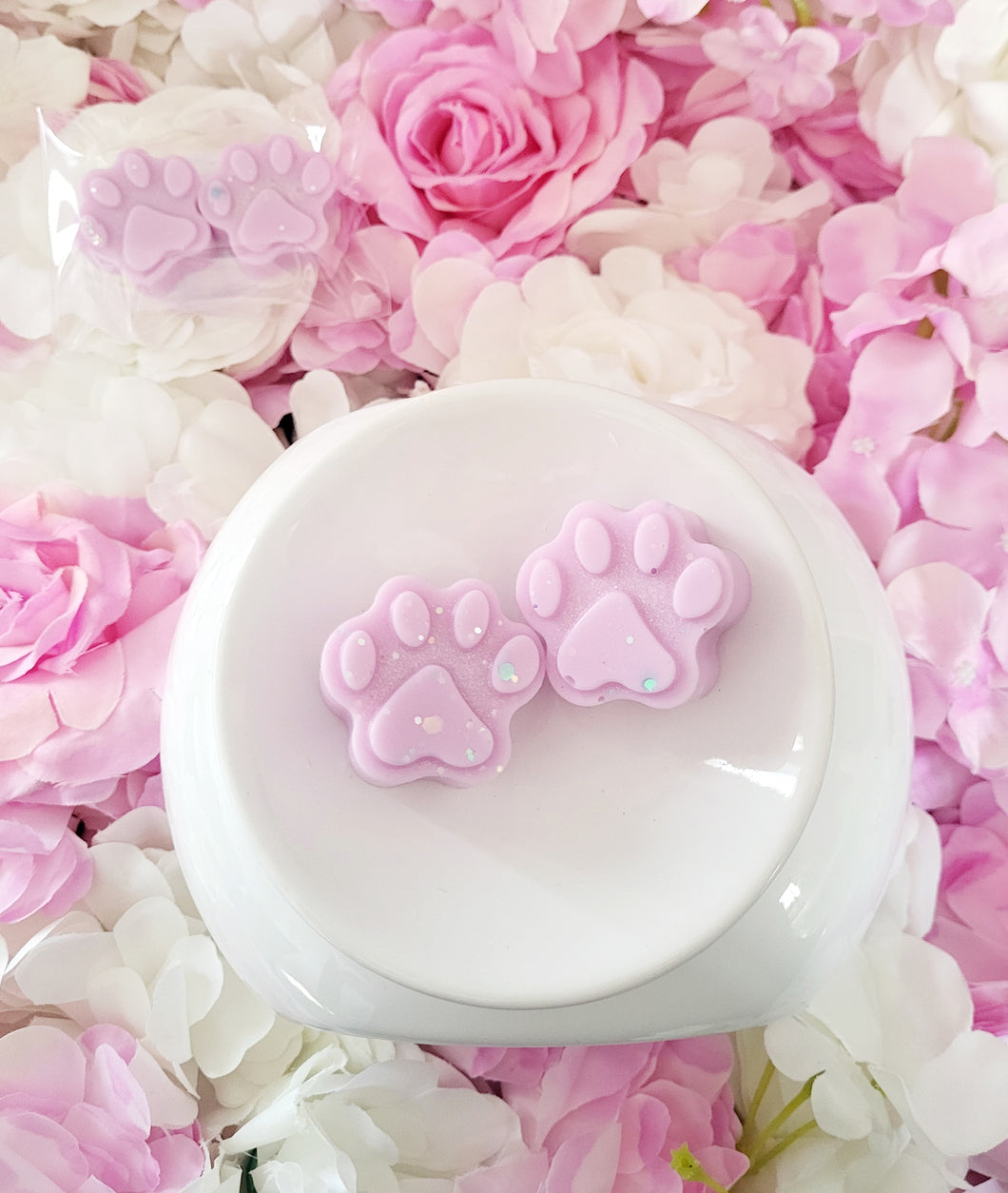 Purple paw print wax melt shapes in frosted wonder rose